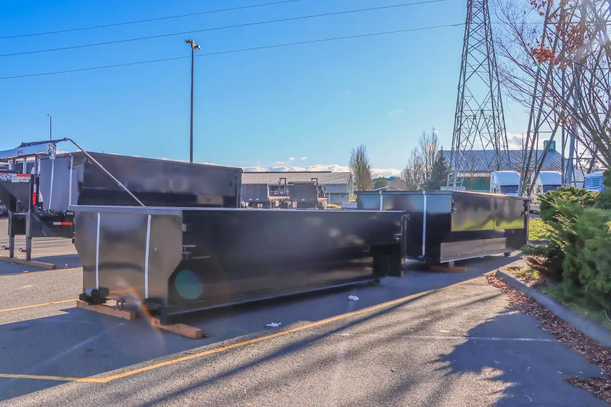 Roll-off dumpster ready for waste disposal at job site for 3 Yard Dumpster Rental in Clinton